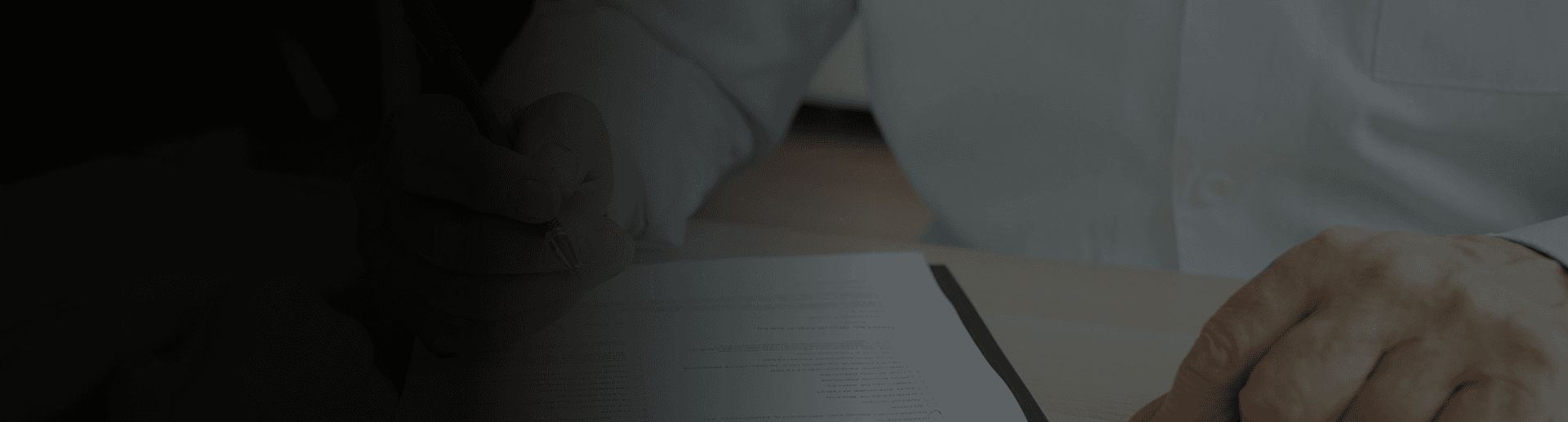 Patient reviewing dental payment paperwork