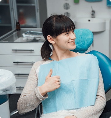 Patient smiling in a dental chair