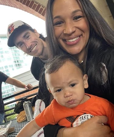 Happy Landmark Smiles patient family with their baby