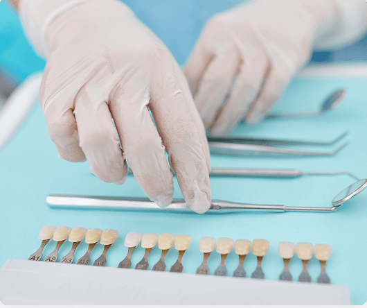 Dental hygienist cleaning a patient's teeth